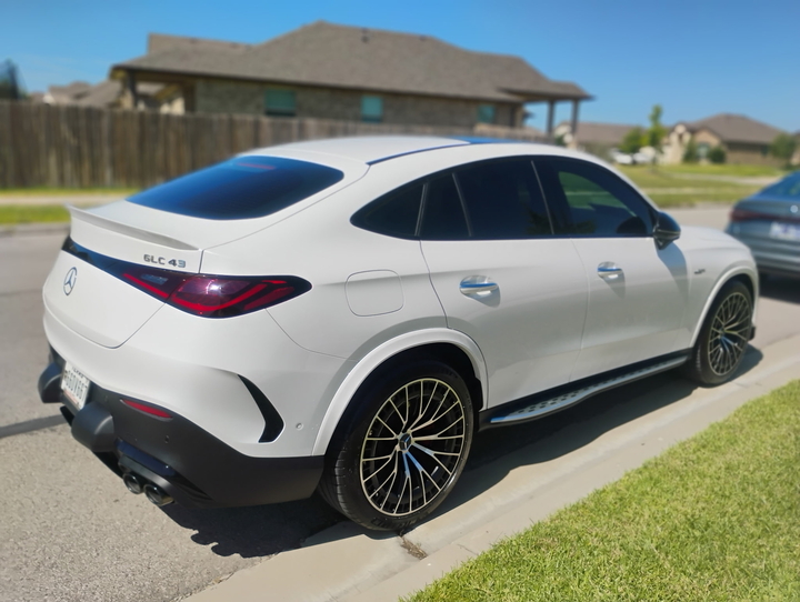 The same Mercedes rinsed, dried and glossy after the detail