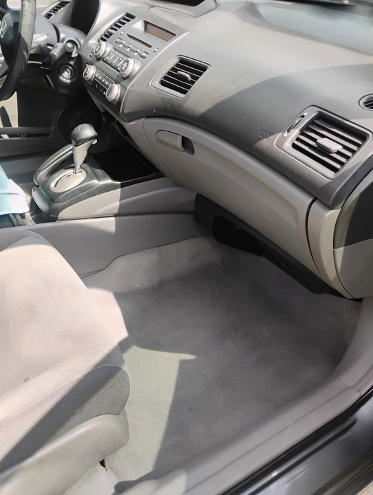 Dashboard and footwell cleaned after the interior detail