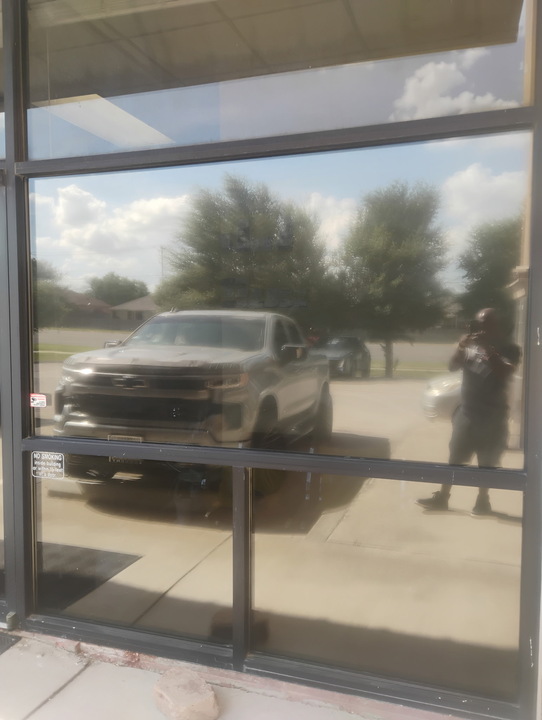 Freshly tinted storefront window glass