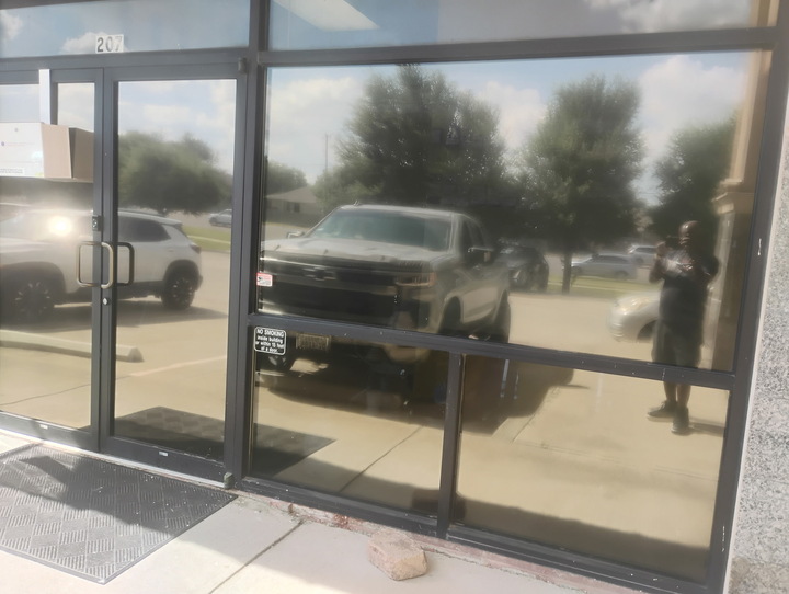 Wide view of a freshly tinted storefront window wall