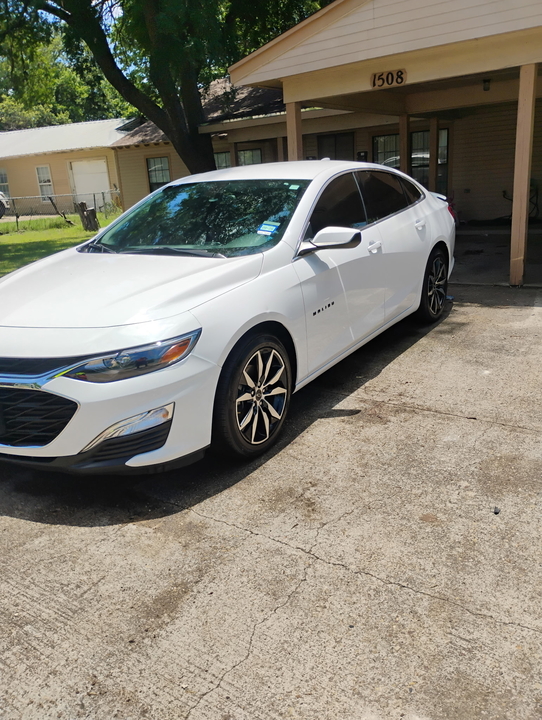 Clean white Chevrolet Malibu, exterior detailed and glossy